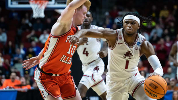 Arkansas' Ricky Council IV brings the ball down the court during the NCAA men's basketball tournament first round match-up between Illinois and Arkansas, on Thursday, March 16, 2023, at Wells Fargo Arena, in Des Moines, Iowa.